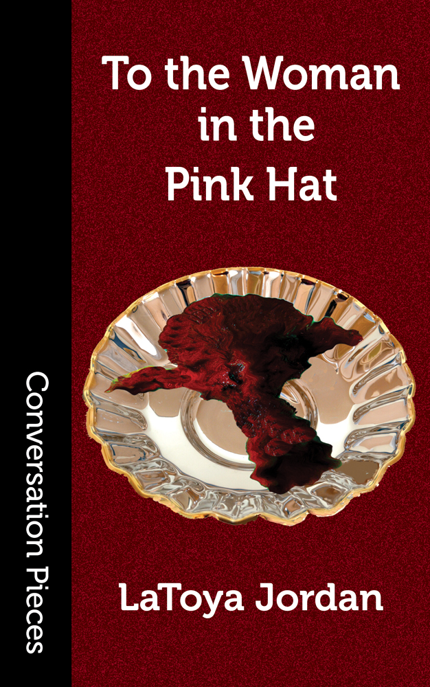 Text: To the Woman in the Pink Hat and image of a bloody, flattened chunk of organ in a fancy silver bowl